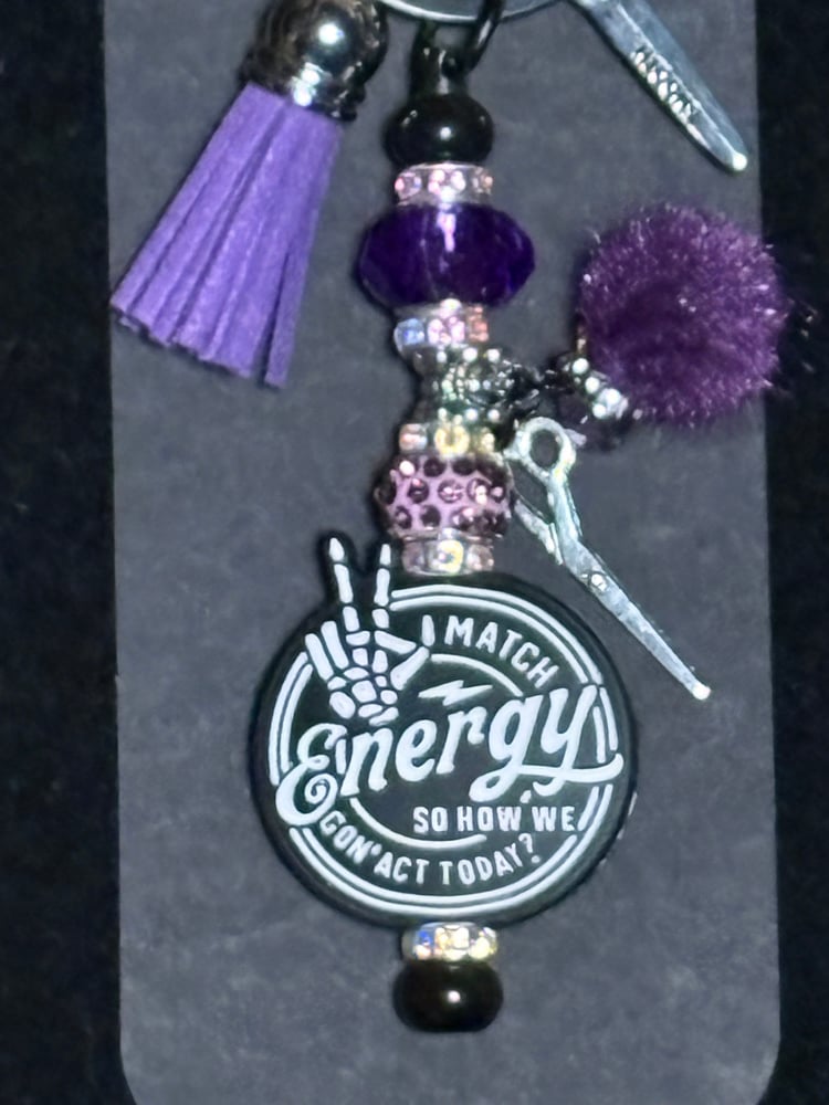 Image of hairstylist inspired black and purple purse clip keychain 