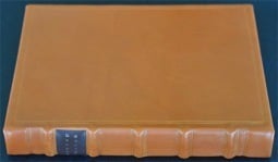 Image of 1734 Book of Common Prayer #1 covered in calfskin.  It measures 1 1/2" X 7 1/4" X 9"