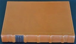 Image of 1734 Book of Common Prayer #1 covered in calfskin. It measures 1 1/2" X 7 1/4" X 9"