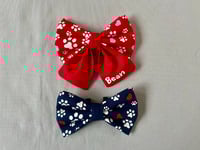 Image 1 of Personalised Valentine Dog Bow - Handmade Red or Navy Bow with Paw Prints and Hearts Design