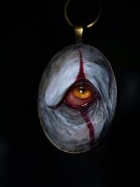 Image 9 of Pennywise Eye glow in the dark pendant OOAK