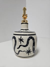 Image 3 of Oil Bottle 10 - Snakes, skulls & bones
