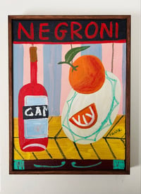 Negroni on pink & blue stripes with oranges