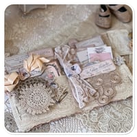 Image 3 of handmade fabric book full of vintage french lace samples