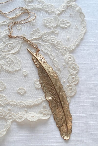 Image of Gold feather pendant
