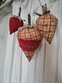 Image 1 of set of 3 prim strawberries