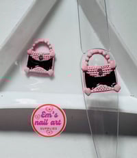 Pink and black handbags 