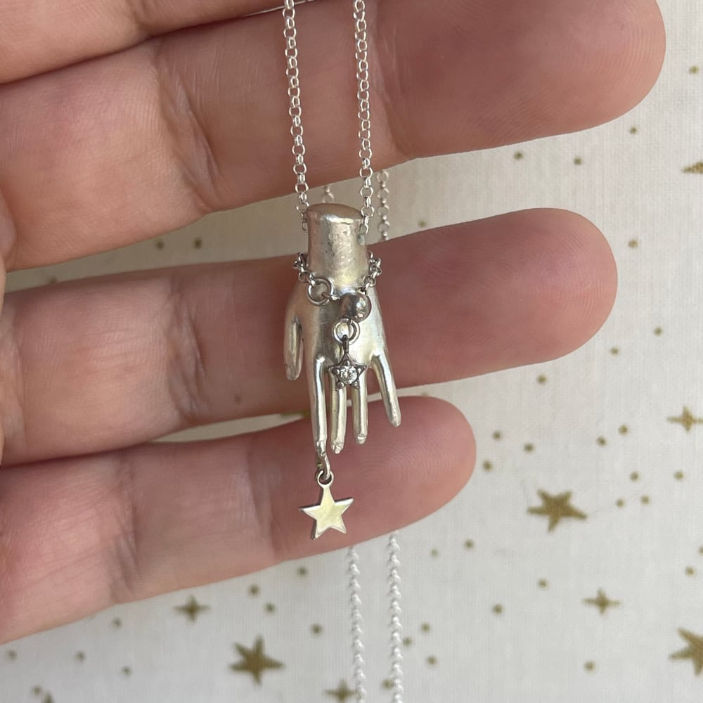 Image of star hand necklace