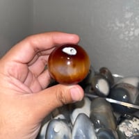 Image 3 of Carnelian x Orca Agate Sphere