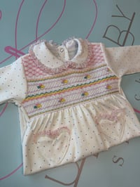 Image 3 of girls multi dot smocked babygrow