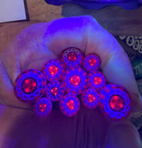 Image 2 of Orange and milky blue stripes with a UV center 