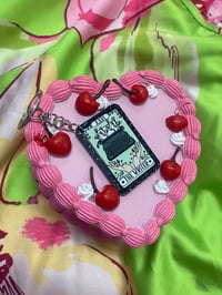 Image 1 of the writer keychain 