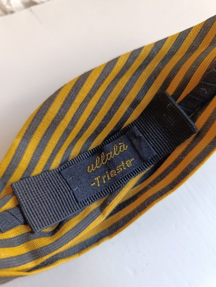 Image of Cerchietto a fascia a righe giallo/nero