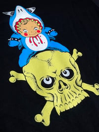 Image 1 of KEWPIE ON A SKULL 