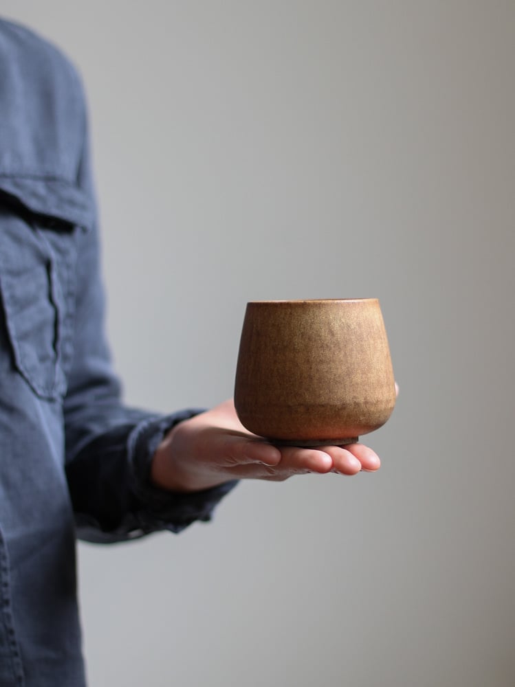Image of large cup in umber