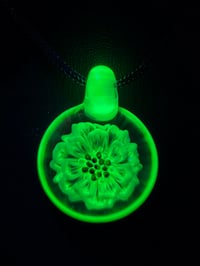 Image 3 of Uv reactive flower pendant. 