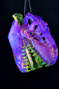 Image 1 of Chunky opal royal jelly Trex skull pendant with uv teeth & joint tip