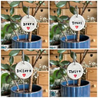 Image 4 of Ceramic Motivational Words with a Heart Motif Tag on a wire stake 