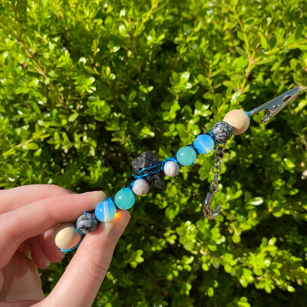 Image of black moon rocks roach clip