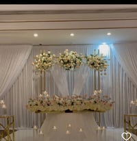 Image 2 of double violence drapeSwag with white sheer voile and flower runners. With Sweetheart Table 