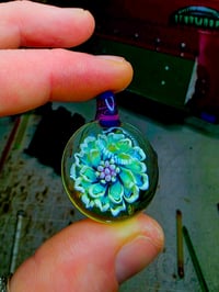 Image 1 of UV reactive flower implosion pendant 🌼🧪