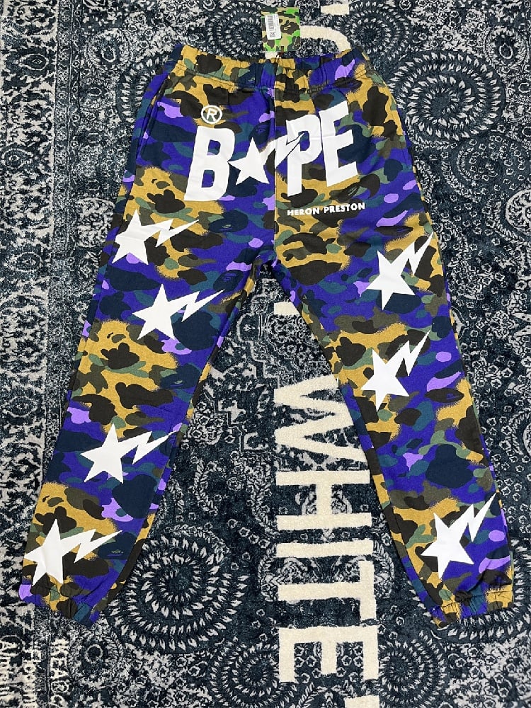 Image of BAPE x Heron Preston Mix 1st Camo Sweatpants