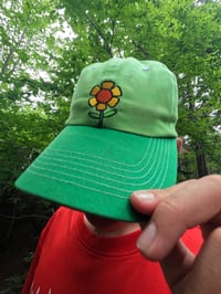 Image 3 of "flower head" hat