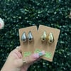 tega girl earrings 