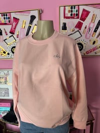 light pink sweater