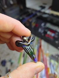 Image 2 of Electrum/amber purple glass shark tooth pendant. 