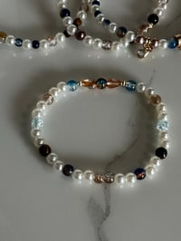 Image 5 of Starlight Shimmer Moon and Stars| Cream, Navy, and Gold  Tumbler Bracelet Stack