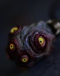 Image 11 of Egg of the King pendant, leather cord, brass hardware, all seeing glowing eyes