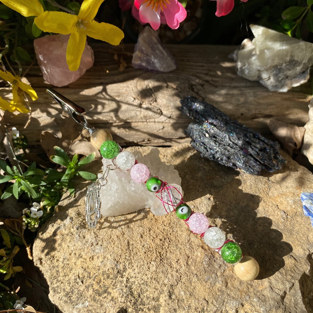 Image of pink leaves roach clip