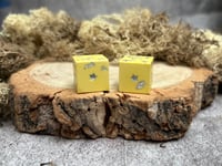 Image 3 of D6 Dice Pair Yellow and Silver Stars
