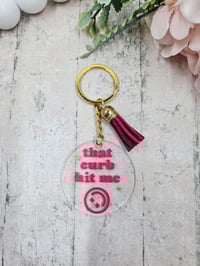 That Curb Hit Me Acrylic Keychain