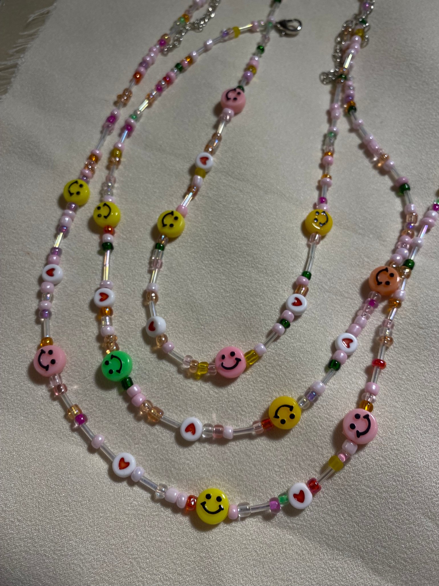 Image of smiley necklaces