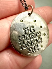 Image 10 of green sapphire pendant with handwritten quote