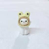 Image 1 of white cat with frog hat ceramic figurine