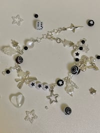 Image 3 of black and white cluttered bracelet