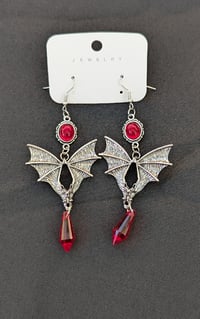 Image 1 of Silver and red bat dangle earrings 