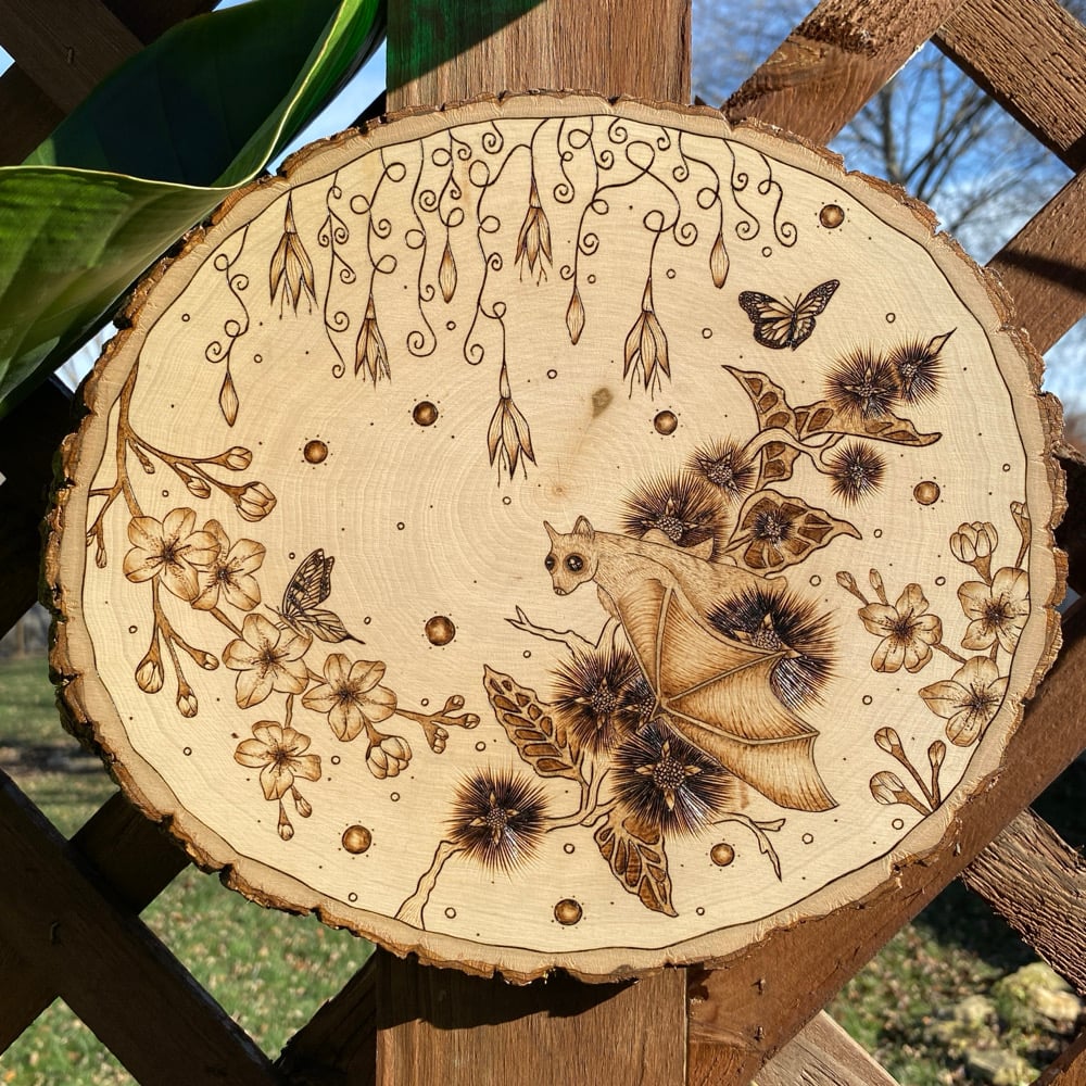 Image of life in the leaves wood art