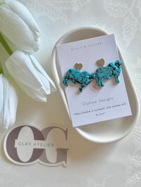 Image 1 of Solid Turquoise Brahman 