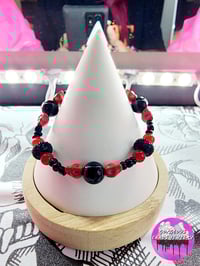 Image 1 of Red n Black Skull Bracelet
