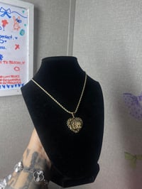 Betty Rolex necklace 