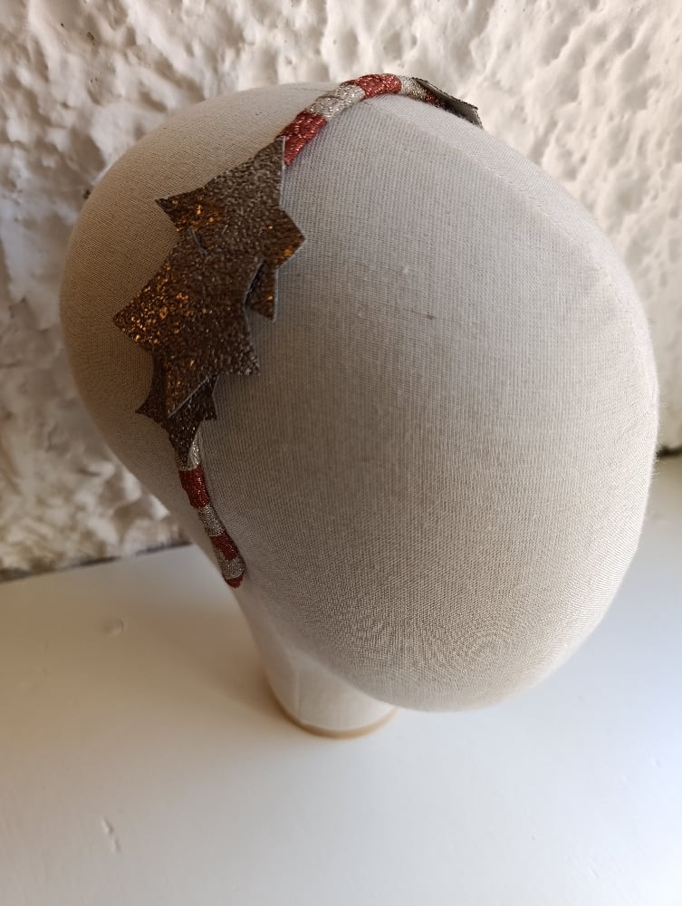 Image of Cerchietto stelle imperfette ambo lati ruggine/oro