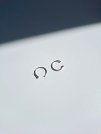 Image 1 of Silver round hugger - small