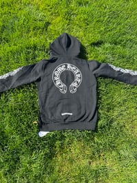 Image 1 of Chrome zip up