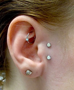 SURFACE TRAGUS PIERCING SERVICES