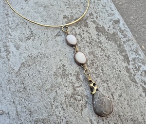 Pebbles and bullet cassings necklace 