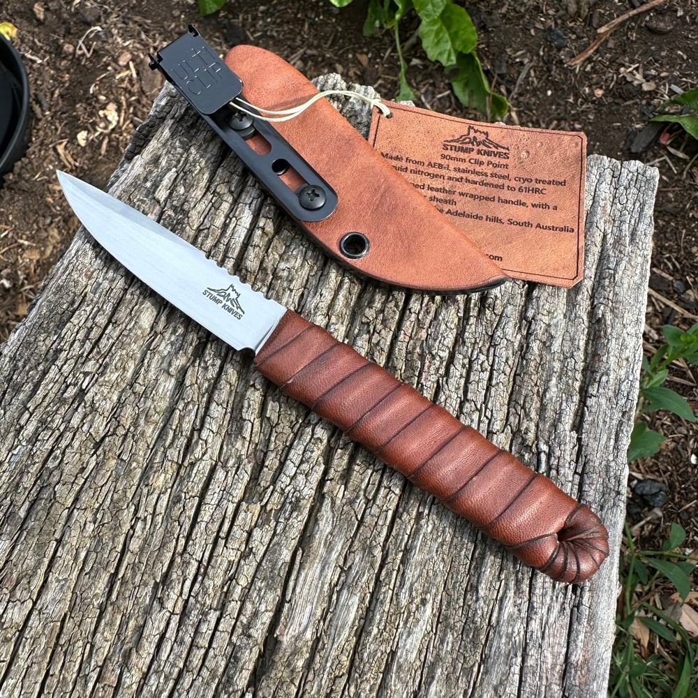 Image of 90mm clip point 14c28 leather